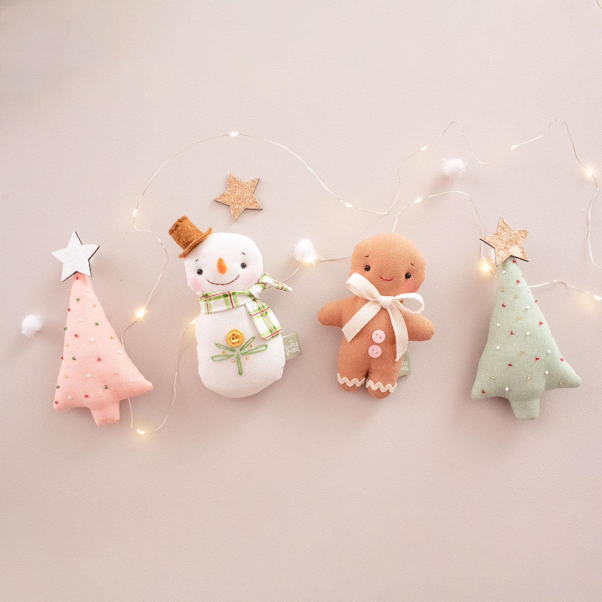 Peach woodland Christmas ornaments in organic linen – grizzly bear, snowman, gingerman, baby deer and squirrel