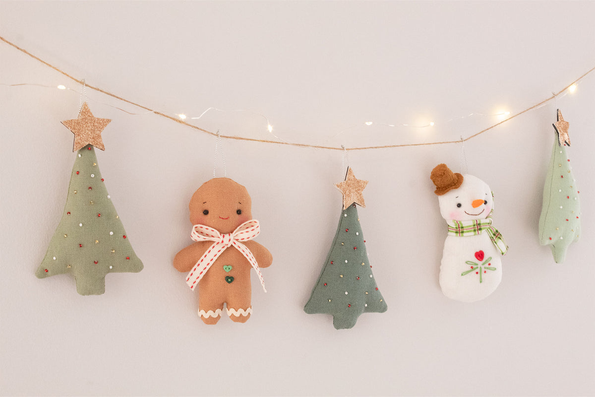Snowman and gingerbread Christmas garland with LED lights
